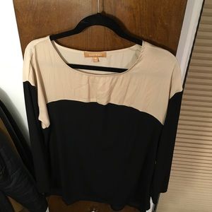 Nude and black long sleeve color block blouse